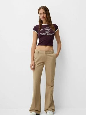 Spodnie materiałowe Bershka wielbłądzi