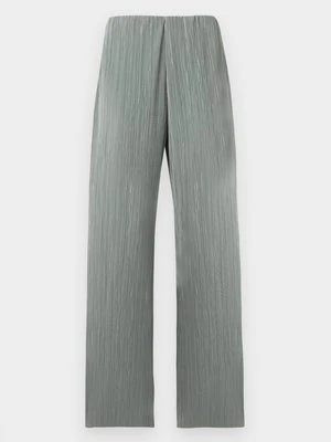 Spodnie materiałowe Calvin Klein jasnozielony
