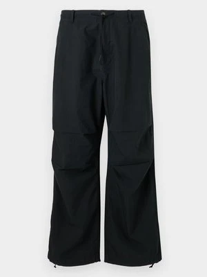 Spodnie materiałowe Calvin Klein Jeans