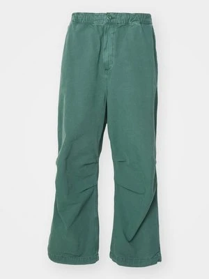 Spodnie materiałowe Carhartt WIP zielony