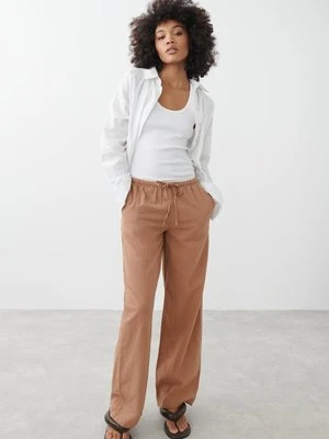 Spodnie materiałowe Gina Tricot