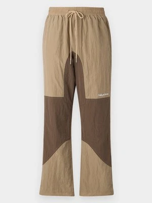 Spodnie materiałowe Kidsuper