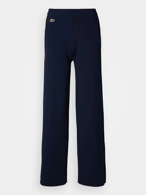 Spodnie materiałowe Lacoste