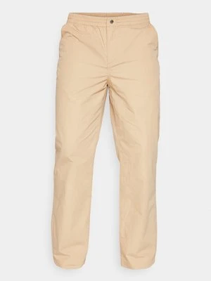 Spodnie materiałowe Lacoste