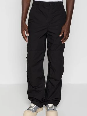 Spodnie materiałowe Lacoste