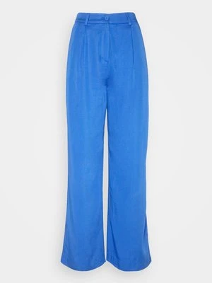 Spodnie materiałowe Monki