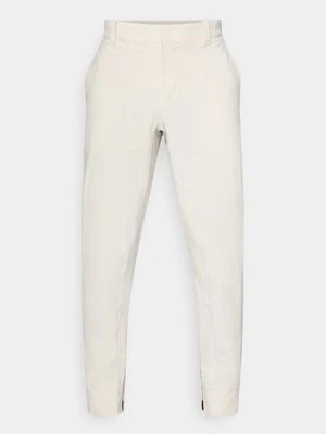 Spodnie materiałowe Nike Golf