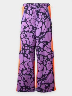 Spodnie materiałowe Nike liliowy