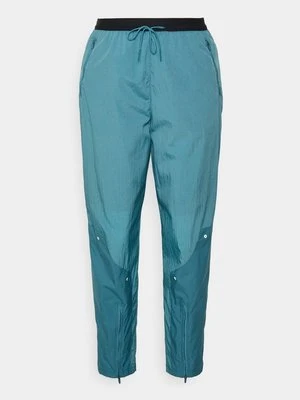 Spodnie materiałowe Nike Performance