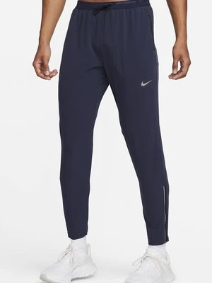 Spodnie materiałowe Nike Performance