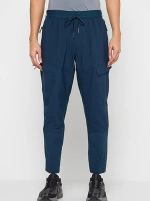 Spodnie materiałowe Nike Performance