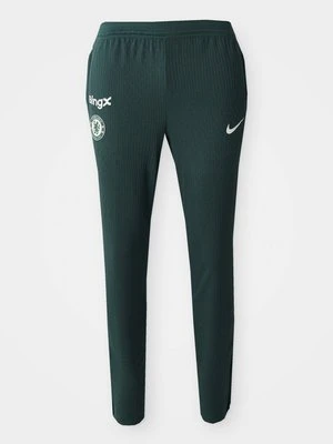 Spodnie materiałowe Nike Performance