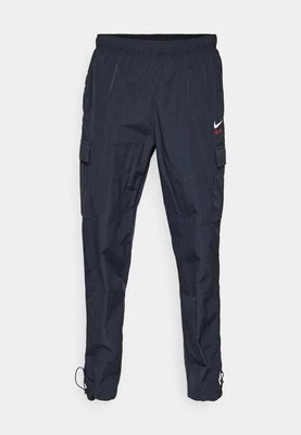 Spodnie materiałowe Nike Sportswear