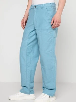 Spodnie materiałowe Nike Sportswear