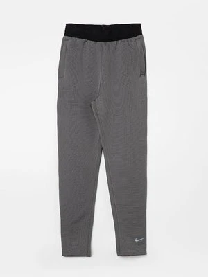 Spodnie materiałowe Nike Sportswear