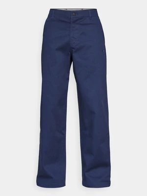 Spodnie materiałowe Nike Sportswear