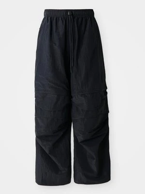 Spodnie materiałowe Nike Sportswear