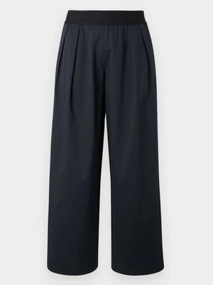 Spodnie materiałowe Nike Sportswear