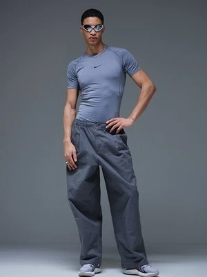 Spodnie materiałowe Nike Sportswear