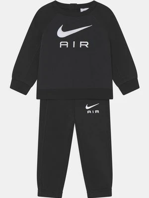 Spodnie materiałowe Nike Sportswear