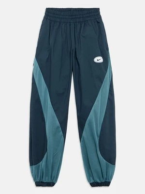 Spodnie materiałowe Nike granatowy