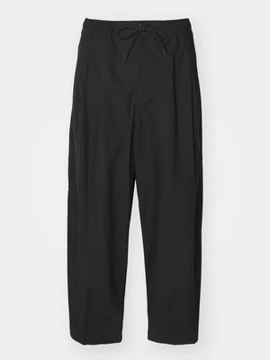 Spodnie materiałowe Nike Sportswear