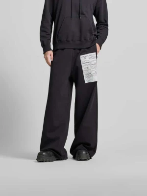 Spodnie materiałowe o kroju loose fit z nadrukiem logo MM6 Maison Margiela Ciemnobrązowy