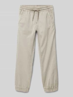 Spodnie materiałowe o kroju regular fit z elastycznymi zakończeniami nogawek Mayoral