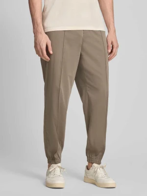 Spodnie materiałowe o kroju regular fit z mieszanki wiskozy z elastycznym pasem Armani Exchange Piaskowy