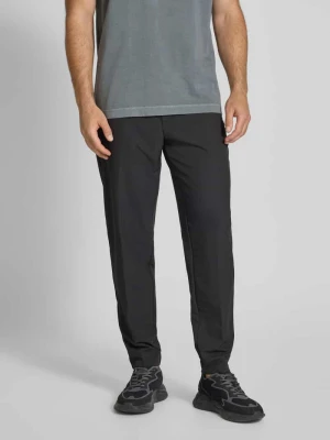 Spodnie materiałowe o kroju relaxed fit z elastycznym pasem model ‘T_Flex’ BOSS Green