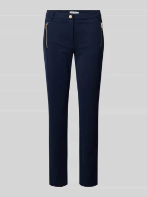 Spodnie materiałowe o kroju slim fit z lamowanymi kieszeniami Christian Berg Woman