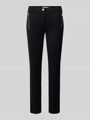 Spodnie materiałowe o kroju slim fit z lamowanymi kieszeniami Christian Berg Woman
