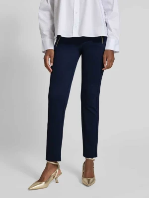 Spodnie materiałowe o kroju slim fit z lamowanymi kieszeniami Christian Berg Woman