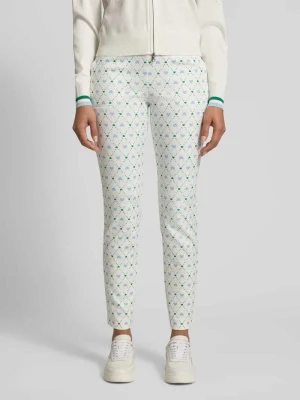 Spodnie materiałowe o kroju slim fit z nadrukiem z logo na całej powierzchni Marc Cain