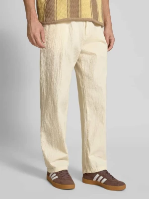 Spodnie materiałowe o kroju straight fit z mieszanki bawełny REVIEW