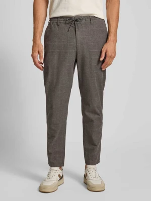 Spodnie materiałowe o kroju tapered fit z mieszanki bawełny z tunelem MCNEAL