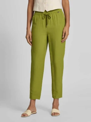 Spodnie materiałowe o kroju tapered fit z tunelem Marc Cain