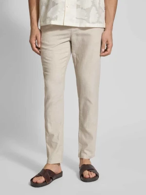 Spodnie materiałowe o kroju tapered fit z tunelem model ‘Warren’ Scotch & Soda