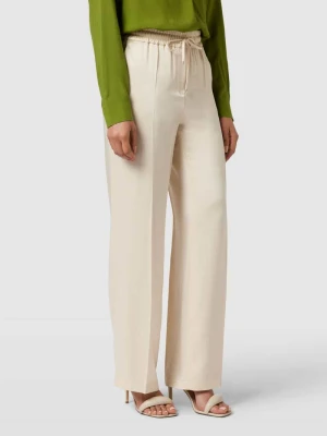 Spodnie materiałowe o rozkloszowanym kroju w kant model ‘AVRIL’ CAMBIO