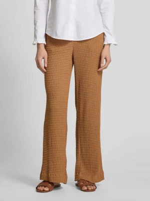 Spodnie materiałowe o rozkloszowanym kroju z fakturowanym wzorem Jake*s Collection