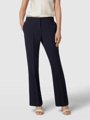 Spodnie materiałowe o rozkloszowanym kroju z ozdobnymi szwami Christian Berg Woman Selection