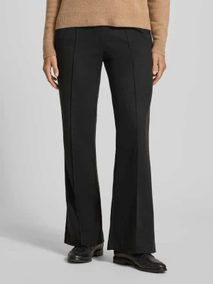 Spodnie materiałowe o rozkloszowanym kroju z przeszytymi kantami Christian Berg Woman