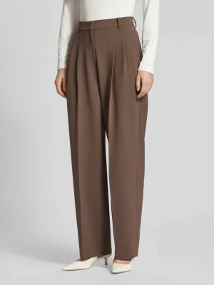 Spodnie materiałowe o szerokim kroju z kieszeniami z tyłu model ‘Emilie’ CAMBIO