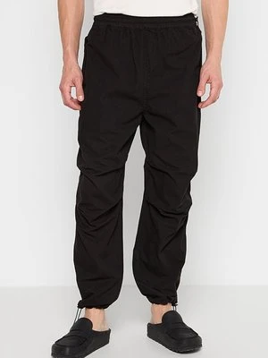 Spodnie materiałowe Revolution