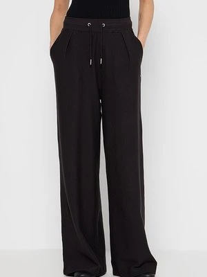 Spodnie materiałowe Tommy Jeans