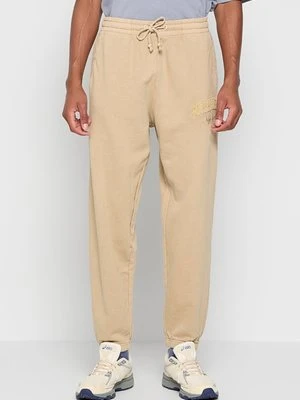 Spodnie materiałowe Tommy Jeans