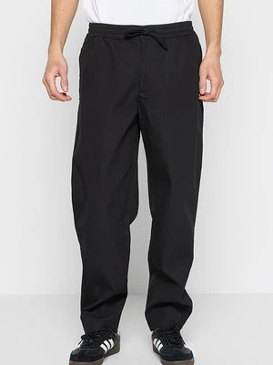 Spodnie materiałowe Tommy Jeans