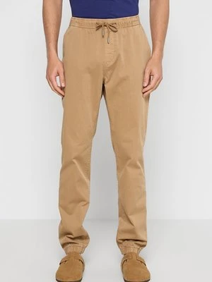 Spodnie materiałowe Tommy Jeans