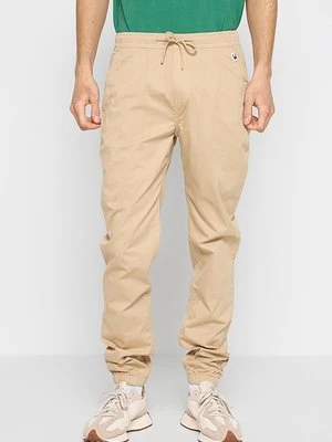 Spodnie materiałowe Tommy Jeans