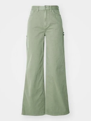 Spodnie materiałowe Tommy Jeans